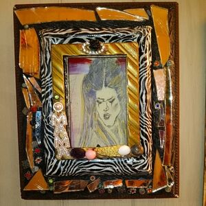 Handmade picture frame embellished with vintage and antique jewels